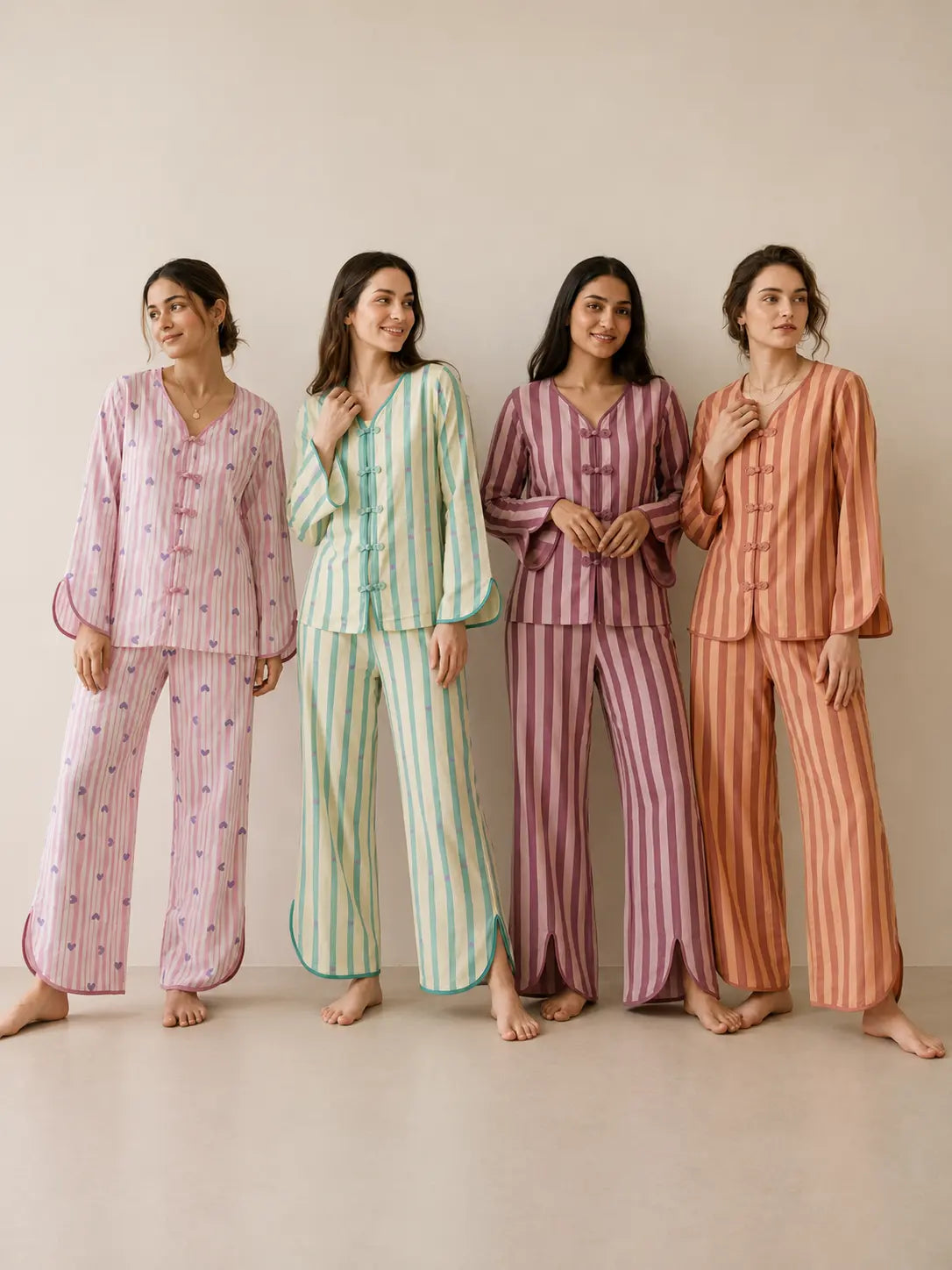 4 women wearing Velure cotton frog button style night suits