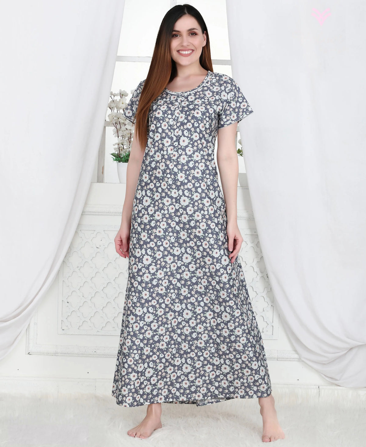 Velure Lush Dark Blue Print Cotton Nighty - Velure, Nighty, Put on Velure's Lush Dark Blue Print Cotton Nighty to impress your peers. Tailored to sartorial perfection from premium quality thick cotton fabric, it provides a soft and soothing touch against the skin. The round neck enhances its appeal by incorporating a line and gathering pattern. The floral print makes it a captivating choice.