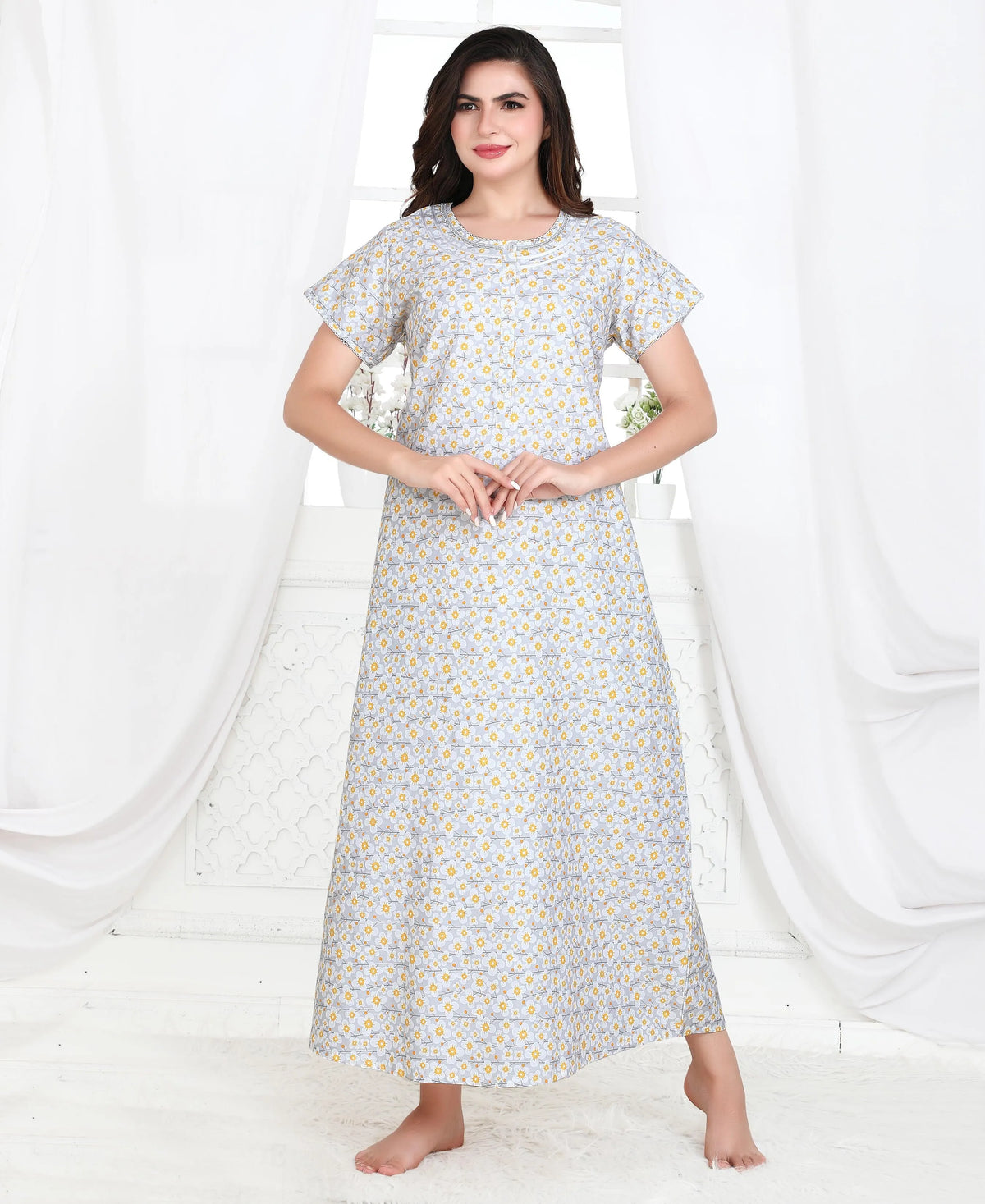 Velure Yellow Floral Print Cotton Nighty - Velure, Nighty, A wonderful mix of style and comfort, this grey cotton nighty from velure will be a smart addition to your wardrobe. Tailored to sartorial perfection from premium quality cotton fabric, it assures a soft and soothing touch against the skin. The round neck adds to its appeal by adding a line & gattering pattern,gattering The floral print makes it a bewitching choice