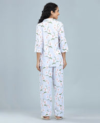 Satin Blossoms Print Satin Night Suit - Velure, Shirt and Pant, Indulge in luxury with Velure's Flower Print Satin Night Suit. Soft satin fabric, elegant collar, 3/4 sleeves, and full-length pants. Vibrant floral print adds a touch of charm. Comfortable fit for a restful sleep. Easy to care for and maintain.