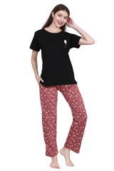 Velure Stunning Floral Print Pajama Set - Velure, T-Shirt and Pant, Experience ultimate relaxation in the Velure Stunning Floral Print Pajama Set. Made from soft, breathable cotton, this set features a relaxed fit short-sleeve top and breezy pants. The playful patterns and elastic waistband provide both comfort and style. Perfect for lounging or a good night's sleep.