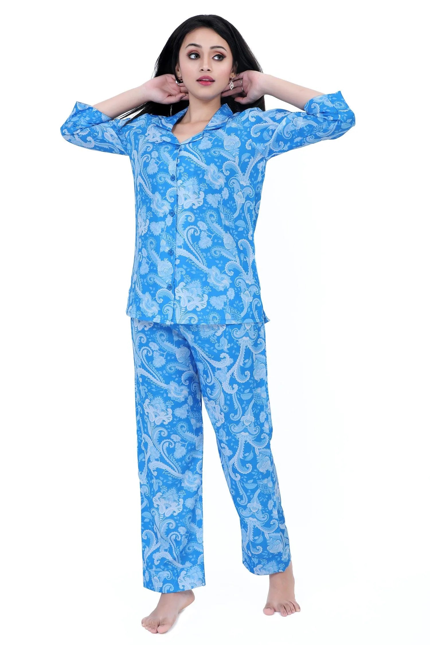 Velure Blue Paisley Print Satin Set - Velure, Shirt and Pant, Elevate your sleepwear wardrobe with Velure's Blue Paisley Print Satin Set. Crafted from luxurious satin material, this set boasts a chic geometric design, lending a touch of elegance to your bedtime ritual. It is equipped with a button-down top and elastic waistband for a comfortable and laid-back feel. Suitable for all seasons and effortless to care for, as it is machine washable.