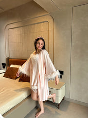 Velure Satin 3 Peice Peach Robe Set - Velure, , Indulge in ultimate relaxation with the stylish Velure Peach Satin 3 Piece Robe Set from Velure. Expertly crafted from luxurious Italian satin, this set offers a soft, silky feel against the skin. The spaghetti strap top is adjustable to fit all body types, while the robe features versatile tie options both inside and out, ensuring a perfect fit. The elegant fur pattern adds a touch of comfort and luxury. Perfect for a peaceful night’s sleep and sweet dreams!