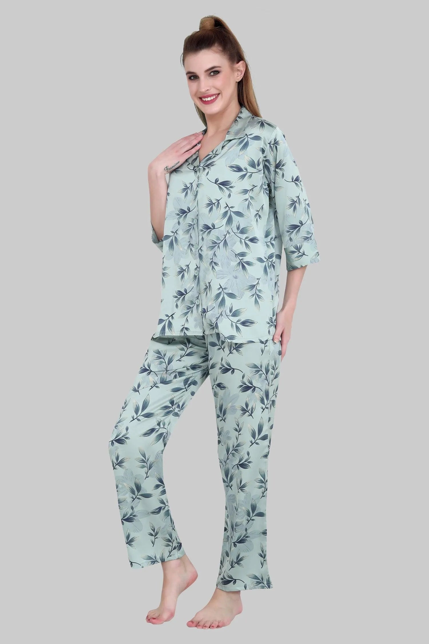 Velure Abstract Leaves Print Satin Night Suit - Velure, Shirt and Pant, Upgrade your wardrobe with the sophisticated charm of Velure's Abstract Leaves Print Satin Night Suit in grey. Made from premium satin, this well-tailored suit provides a luxurious, soft, and soothing feel against the skin. The elegant satin collar adds a touch of refinement and exclusivity to the overall look.