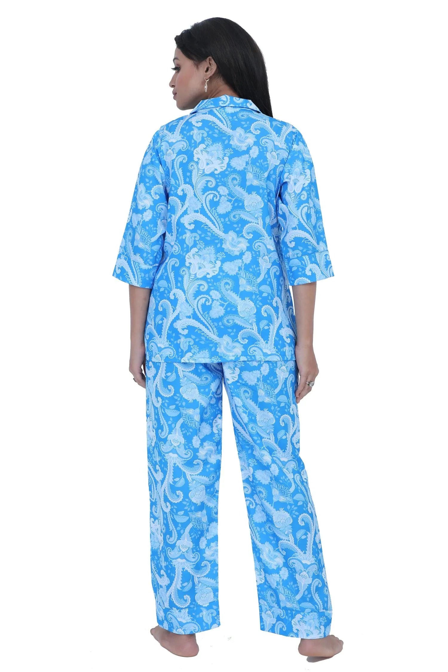 Velure Blue Paisley Print Satin Set - Velure, Shirt and Pant, Elevate your sleepwear wardrobe with Velure's Blue Paisley Print Satin Set. Crafted from luxurious satin material, this set boasts a chic geometric design, lending a touch of elegance to your bedtime ritual. It is equipped with a button-down top and elastic waistband for a comfortable and laid-back feel. Suitable for all seasons and effortless to care for, as it is machine washable.