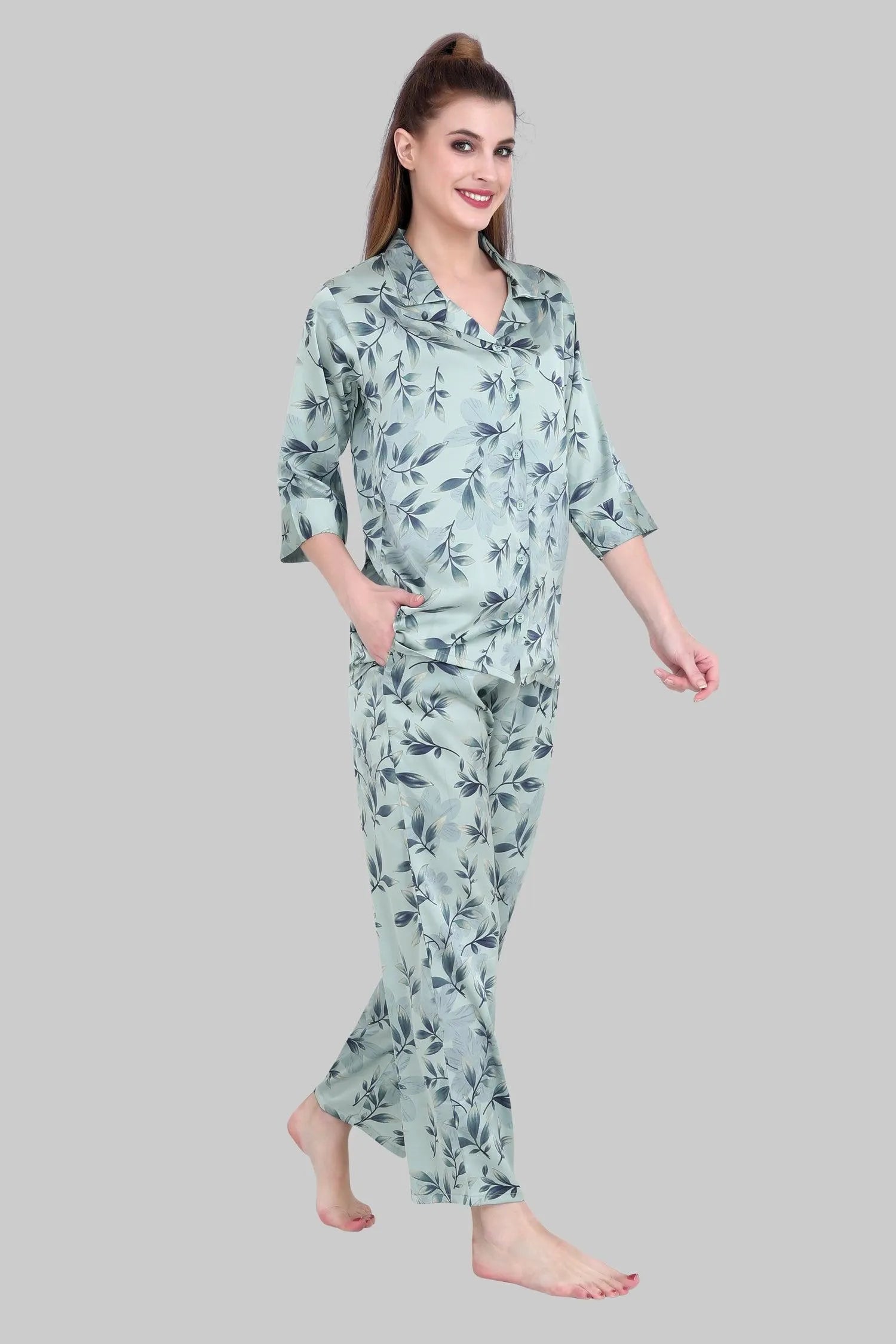 Velure Abstract Leaves Print Satin Night Suit - Velure, Shirt and Pant, Upgrade your wardrobe with the sophisticated charm of Velure's Abstract Leaves Print Satin Night Suit in grey. Made from premium satin, this well-tailored suit provides a luxurious, soft, and soothing feel against the skin. The elegant satin collar adds a touch of refinement and exclusivity to the overall look.