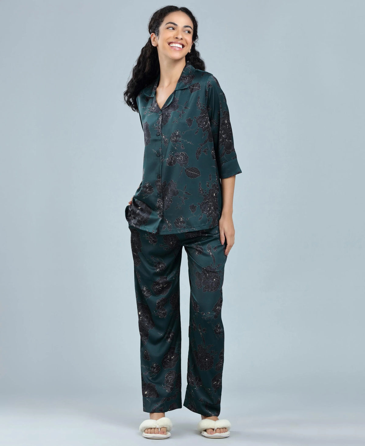 Velure Delightful Floral Satin Print Night Suit - Velure, Long Top and Pant, Elevate your weekend attire with Velure's Delightful Floral Satin Print Night Suit. Made from luxurious satin material, this set offers unparalleled comfort and softness. The dark green floral design brings a sense of cheer to the outfit. Including a 3/4 sleeve top and full-length pants with an elastic waistband, this suit guarantees a comfortably snug fit. Enjoy a peaceful night's rest accompanied by pleasant dreams.