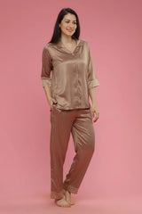 Velure All Over Stripes Satin Set - Velure, Shirt and Pant, Elevate your sleepwear collection with the Velure All Over Stripes Satin Set. This set features a luxurious satin material with a chic geometric design, adding an elegant touch to your bedtime routine. Its button-down top and elastic waistband provide a comfortable and relaxed fit. Perfect for all seasons and easy to maintain, as it is machine washable.