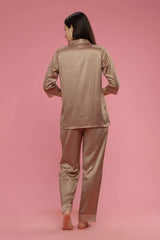 Velure All Over Stripes Satin Set - Velure, Shirt and Pant, Elevate your sleepwear collection with the Velure All Over Stripes Satin Set. This set features a luxurious satin material with a chic geometric design, adding an elegant touch to your bedtime routine. Its button-down top and elastic waistband provide a comfortable and relaxed fit. Perfect for all seasons and easy to maintain, as it is machine washable.