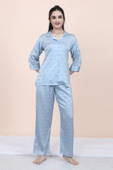 Velure Ethnic Bow Print Satin Night Suit - Velure, Shirt and Pant, Upgrade your sleepwear assortment with the addition of Velure's Ethnic Bow Print Satin Night Suit. Crafted from luxurious satin, this ensemble provides a soothing and gentle feeling against the skin. Its elegant printed design seamlessly combines style and comfort, making it a essential piece in your sleepwear collection.